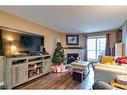 4116-13045 6 Street Sw, Calgary, AB  - Indoor Photo Showing Living Room With Fireplace 