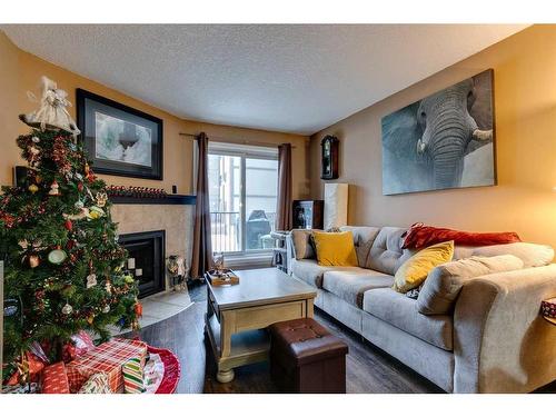 4116-13045 6 Street Sw, Calgary, AB - Indoor Photo Showing Living Room With Fireplace