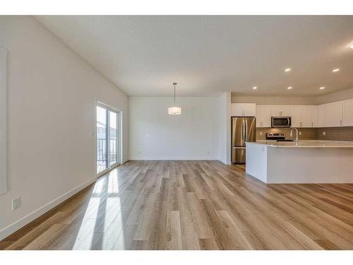 325 Baneberry Way Sw, Airdrie, AB - Indoor Photo Showing Kitchen