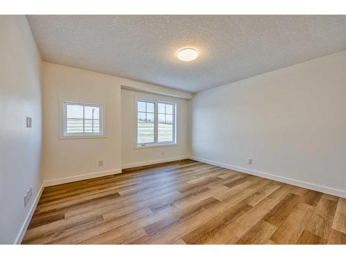 325 Baneberry Way Sw, Airdrie, AB - Indoor Photo Showing Other Room