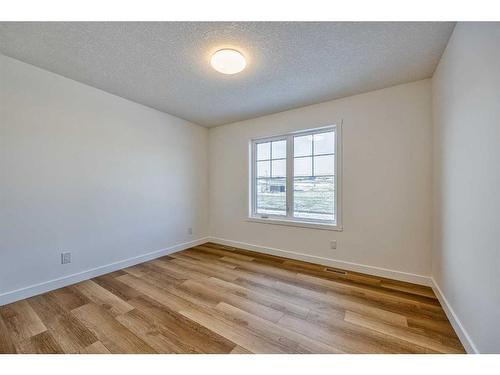 325 Baneberry Way Sw, Airdrie, AB - Indoor Photo Showing Other Room