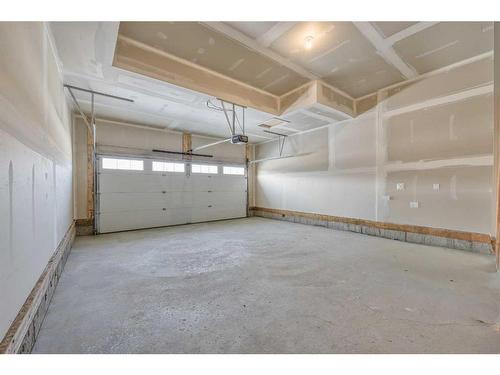 325 Baneberry Way Sw, Airdrie, AB - Indoor Photo Showing Garage