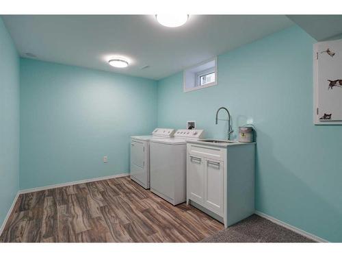 6119 Penedo Way Se, Calgary, AB - Indoor Photo Showing Laundry Room