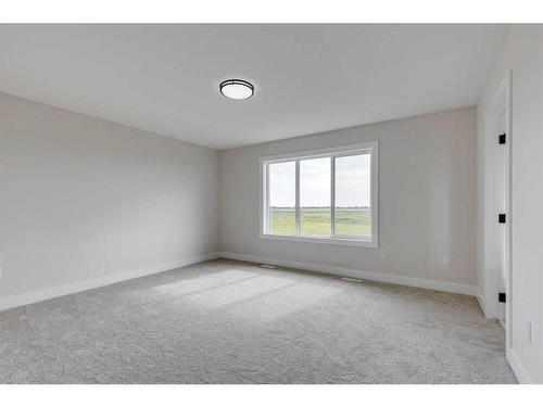 58 Hanson Drive Ne, Langdon, AB - Indoor Photo Showing Other Room