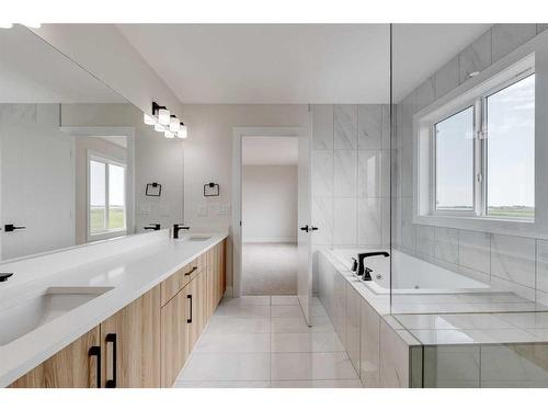 58 Hanson Drive Ne, Langdon, AB - Indoor Photo Showing Bathroom