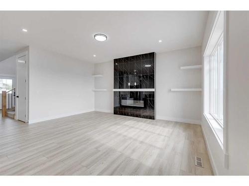 58 Hanson Drive Ne, Langdon, AB - Indoor Photo Showing Living Room