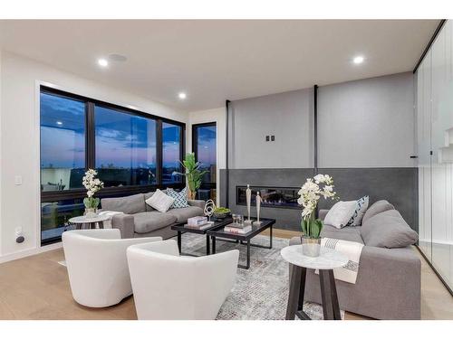 120 13 Street Ne, Calgary, AB - Indoor Photo Showing Living Room With Fireplace