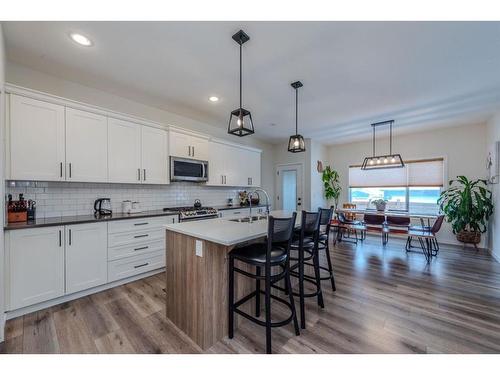 596 Chinook Gate Square, Airdrie, AB - Indoor Photo Showing Kitchen With Upgraded Kitchen