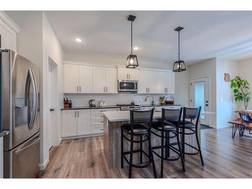 596 Chinook Gate Square, Airdrie, AB - Indoor Photo Showing Kitchen With Stainless Steel Kitchen With Upgraded Kitchen