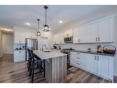 596 Chinook Gate Square, Airdrie, AB - Indoor Photo Showing Kitchen With Stainless Steel Kitchen With Upgraded Kitchen