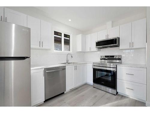 5137 17 Avenue Nw, Calgary, AB - Indoor Photo Showing Kitchen With Stainless Steel Kitchen