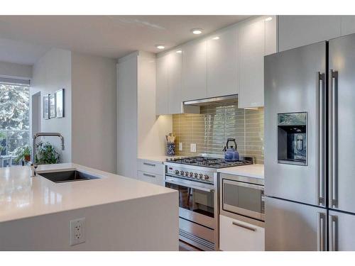 1303-1234 5 Avenue Nw, Calgary, AB - Indoor Photo Showing Kitchen With Stainless Steel Kitchen With Upgraded Kitchen