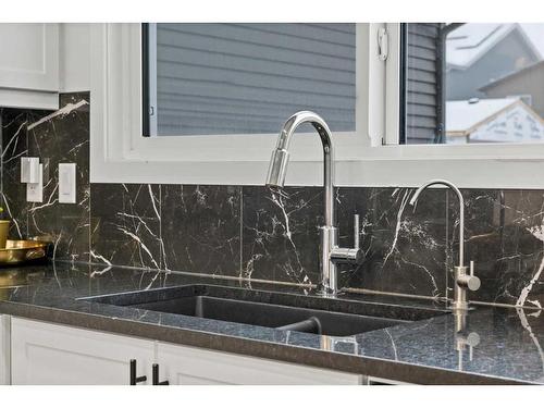 240 Belmont Boulevard Sw, Calgary, AB - Indoor Photo Showing Kitchen With Double Sink