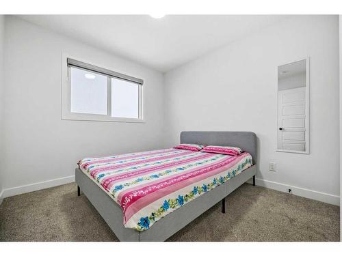 240 Belmont Boulevard Sw, Calgary, AB - Indoor Photo Showing Bedroom