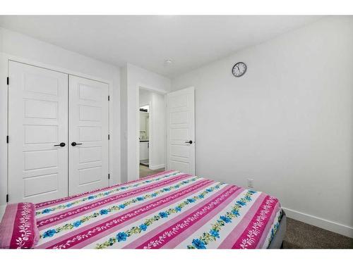 240 Belmont Boulevard Sw, Calgary, AB - Indoor Photo Showing Bedroom