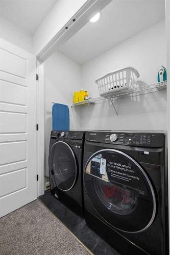 240 Belmont Boulevard Sw, Calgary, AB - Indoor Photo Showing Laundry Room