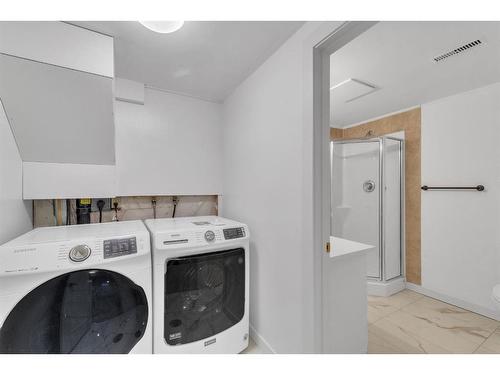 116 Strathcona Close Sw, Calgary, AB - Indoor Photo Showing Laundry Room