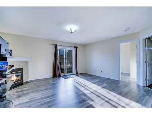 315 Appleglen Place Se, Calgary, AB - Indoor With Fireplace