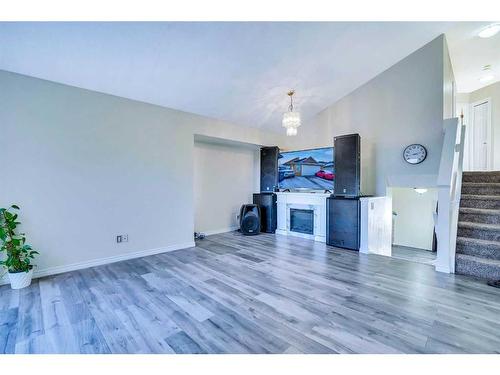 315 Appleglen Place Se, Calgary, AB - Indoor With Fireplace