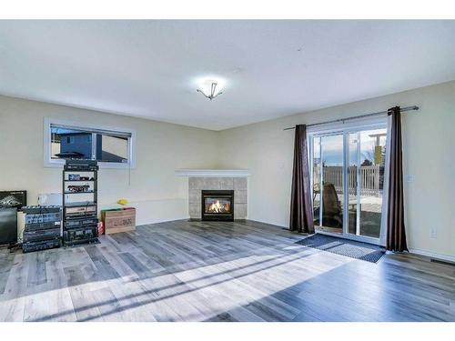 315 Appleglen Place Se, Calgary, AB - Indoor Photo Showing Living Room With Fireplace