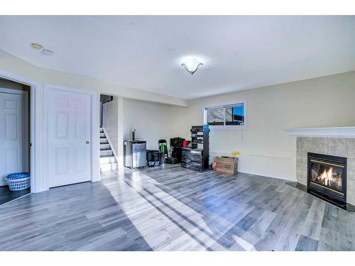 315 Appleglen Place Se, Calgary, AB - Indoor With Fireplace