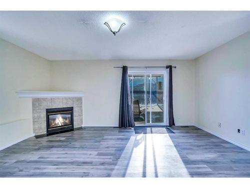 315 Appleglen Place Se, Calgary, AB - Indoor With Fireplace