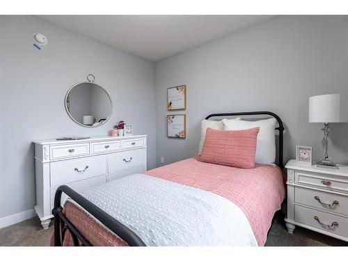 131 Saddlebred Place, Cochrane, AB - Indoor Photo Showing Bedroom