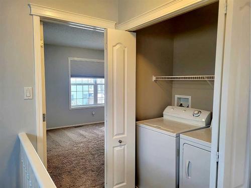 2398 Sagewood Crescent Sw, Airdrie, AB - Indoor Photo Showing Laundry Room