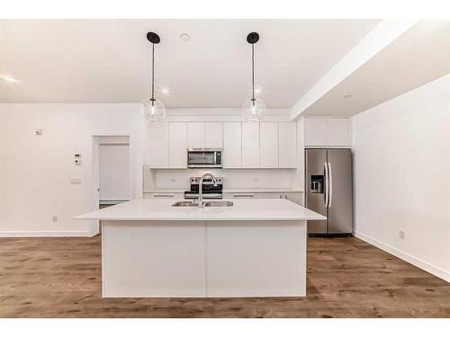 2402-60 Skyview Ranch Road Ne, Calgary, AB - Indoor Photo Showing Kitchen With Double Sink