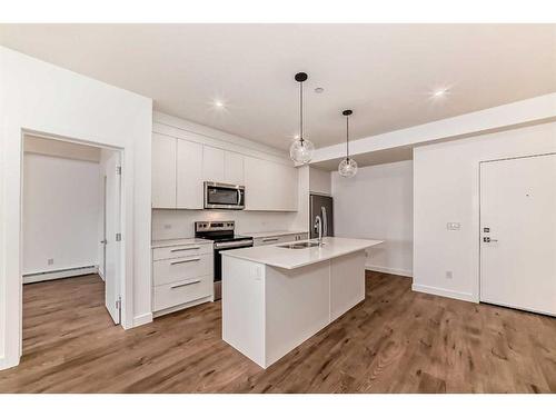 2402-60 Skyview Ranch Road Ne, Calgary, AB - Indoor Photo Showing Kitchen With Stainless Steel Kitchen With Double Sink With Upgraded Kitchen