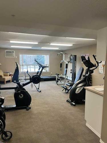 3111-3000 Millrise Point Sw, Calgary, AB - Indoor Photo Showing Gym Room