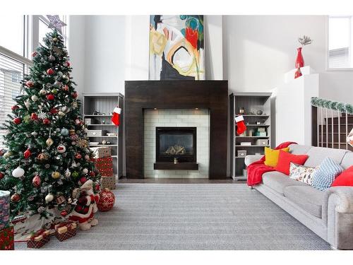 100 Cranridge Crescent Se, Calgary, AB - Indoor Photo Showing Living Room With Fireplace