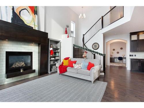 100 Cranridge Crescent Se, Calgary, AB - Indoor Photo Showing Living Room With Fireplace