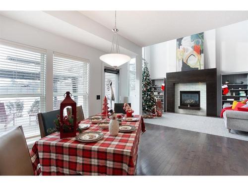 100 Cranridge Crescent Se, Calgary, AB - Indoor With Fireplace