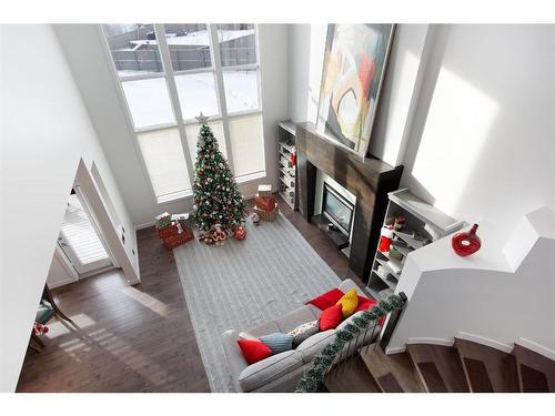 100 Cranridge Crescent Se, Calgary, AB - Indoor With Fireplace