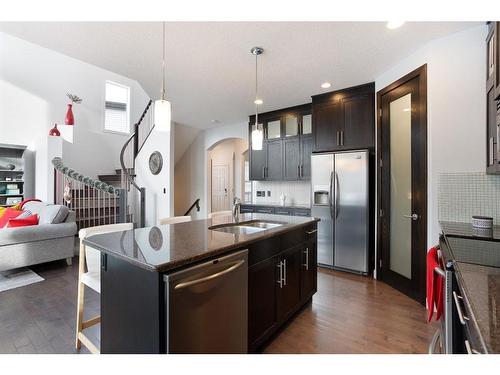 100 Cranridge Crescent Se, Calgary, AB - Indoor Photo Showing Kitchen With Double Sink With Upgraded Kitchen