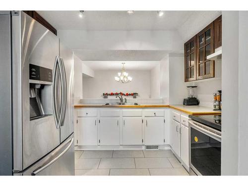 1401-919 38 Street Ne, Calgary, AB - Indoor Photo Showing Kitchen With Double Sink