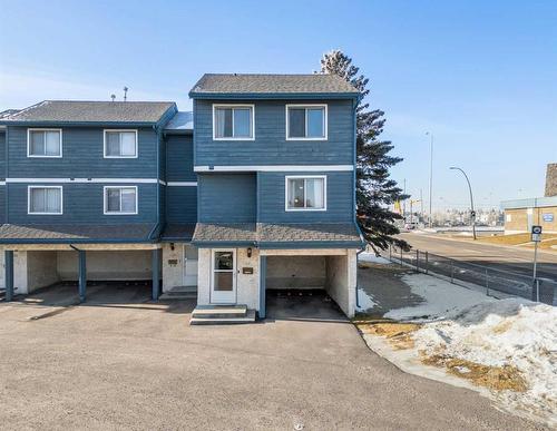 1401-919 38 Street Ne, Calgary, AB - Outdoor With Facade