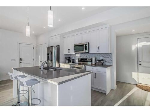 272 Canals Crossing Sw, Airdrie, AB - Indoor Photo Showing Kitchen With Stainless Steel Kitchen With Upgraded Kitchen