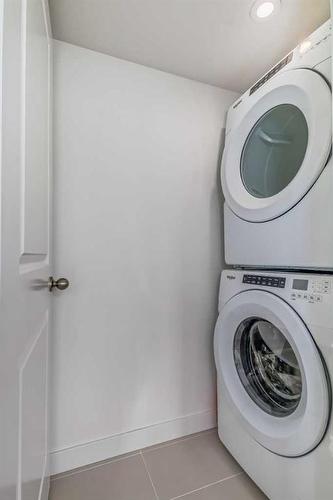 272 Canals Crossing Sw, Airdrie, AB - Indoor Photo Showing Laundry Room