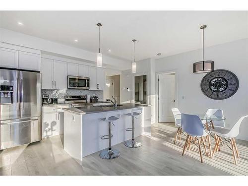 272 Canals Crossing Sw, Airdrie, AB - Indoor Photo Showing Kitchen With Stainless Steel Kitchen With Upgraded Kitchen