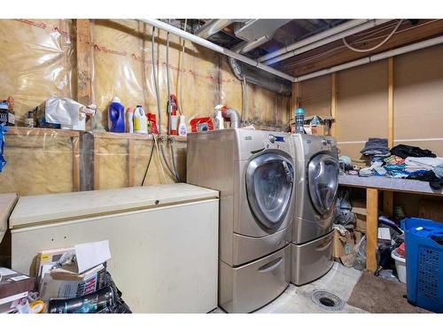 35 Applefield Close Se, Calgary, AB - Indoor Photo Showing Laundry Room