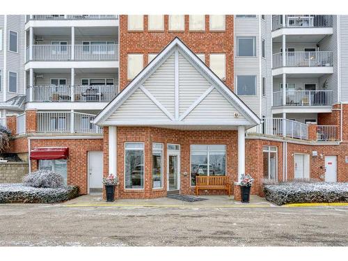 101-2101 Hawksbrow Point Nw, Calgary, AB - Outdoor With Balcony With Facade