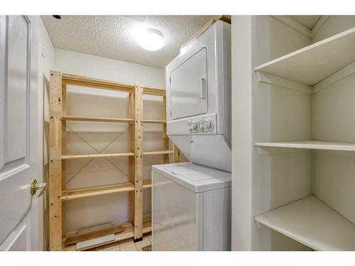 101-2101 Hawksbrow Point Nw, Calgary, AB - Indoor Photo Showing Laundry Room