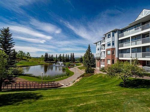 101-2101 Hawksbrow Point Nw, Calgary, AB - Outdoor With Balcony