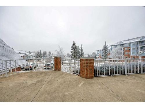 101-2101 Hawksbrow Point Nw, Calgary, AB - Outdoor