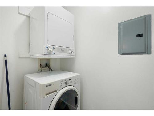 1113-4975 130 Avenue Se, Calgary, AB - Indoor Photo Showing Laundry Room