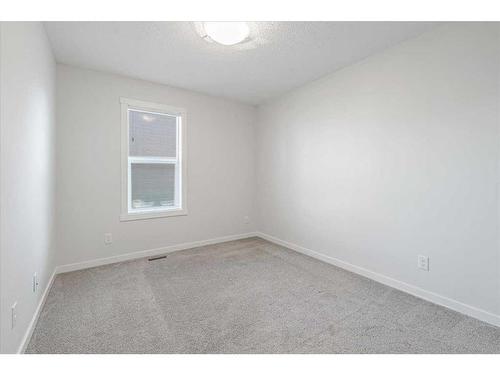 303 Cranbrook Square Se, Calgary, AB - Indoor Photo Showing Other Room