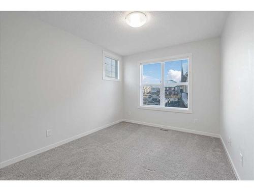 303 Cranbrook Square Se, Calgary, AB - Indoor Photo Showing Other Room