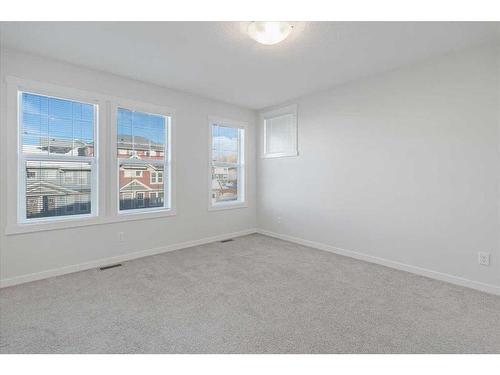 303 Cranbrook Square Se, Calgary, AB - Indoor Photo Showing Other Room